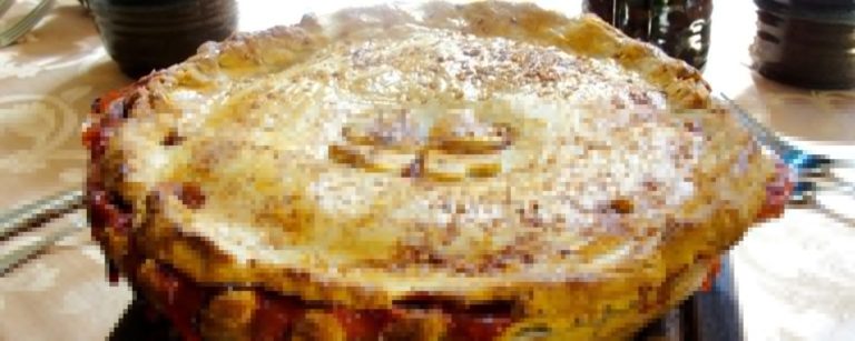 a pixelated image of a baked pie