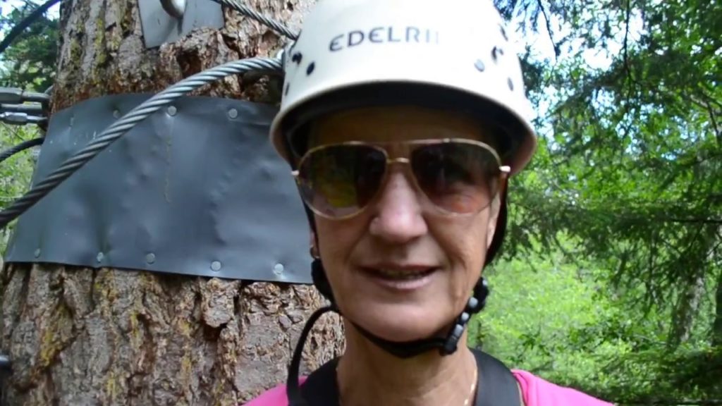 woman wearing a white helmet and sunglasses