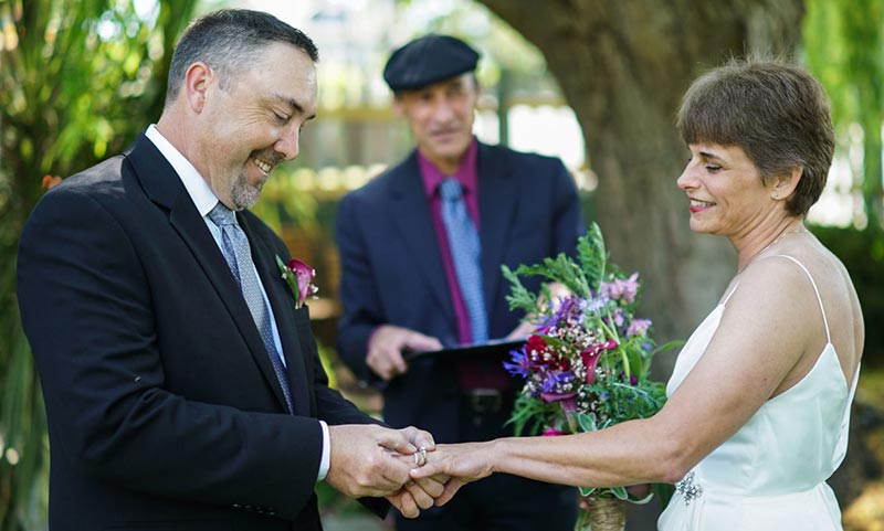 A Ceremony under the willow tree at our beautiful San Juan Island wedding venues