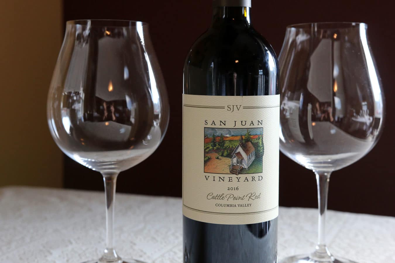 San Juan Vineyard's wine bottle with two wine glasses