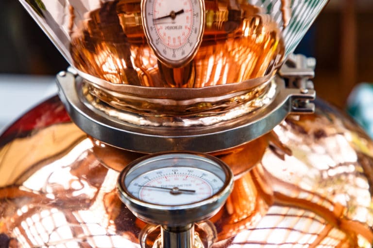 Copper still with dial visible