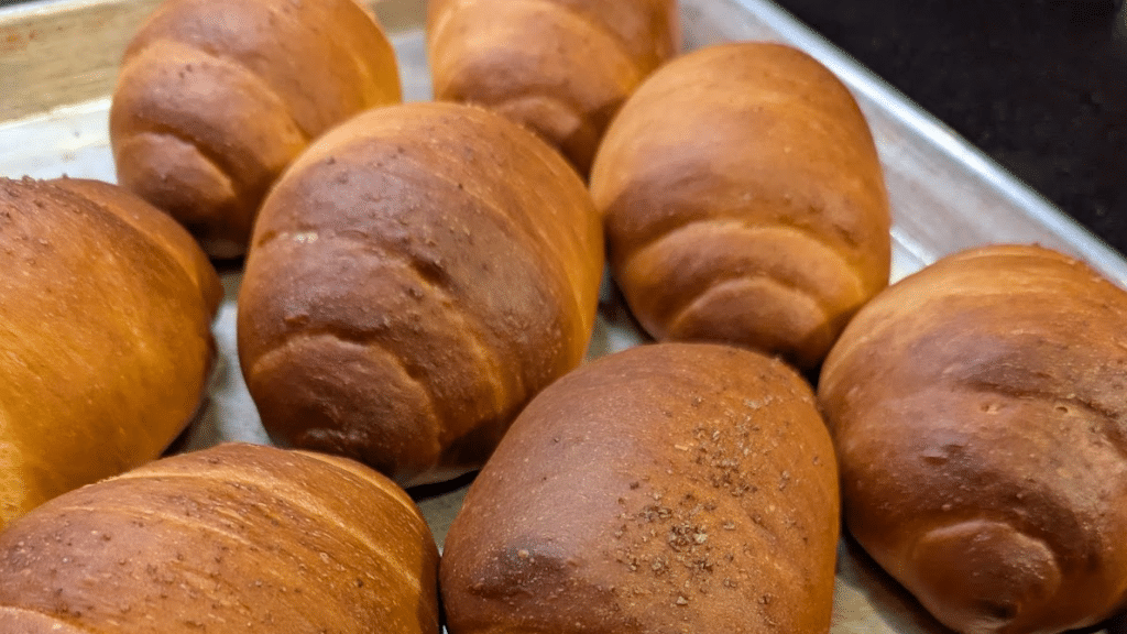 bread rolls on a baking tray