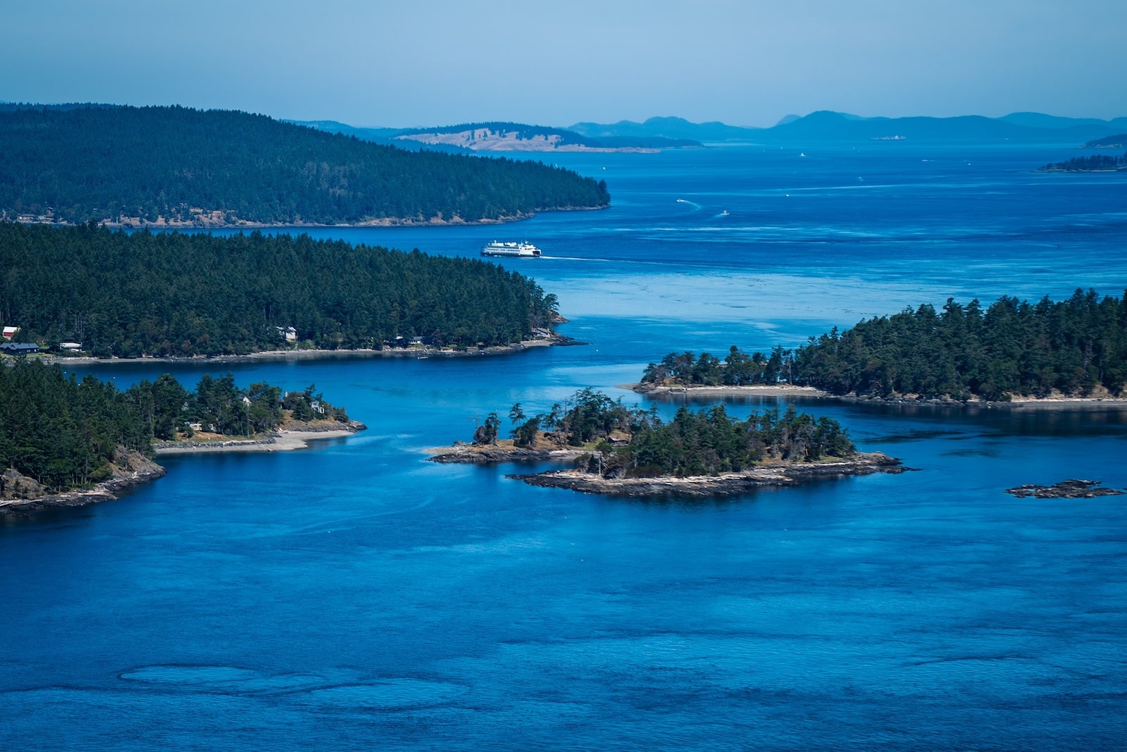 Use the San Juan Island Ferry to travel between the different San Juan Islands. Here you can see the Washington State Ferry on the move between islands. 