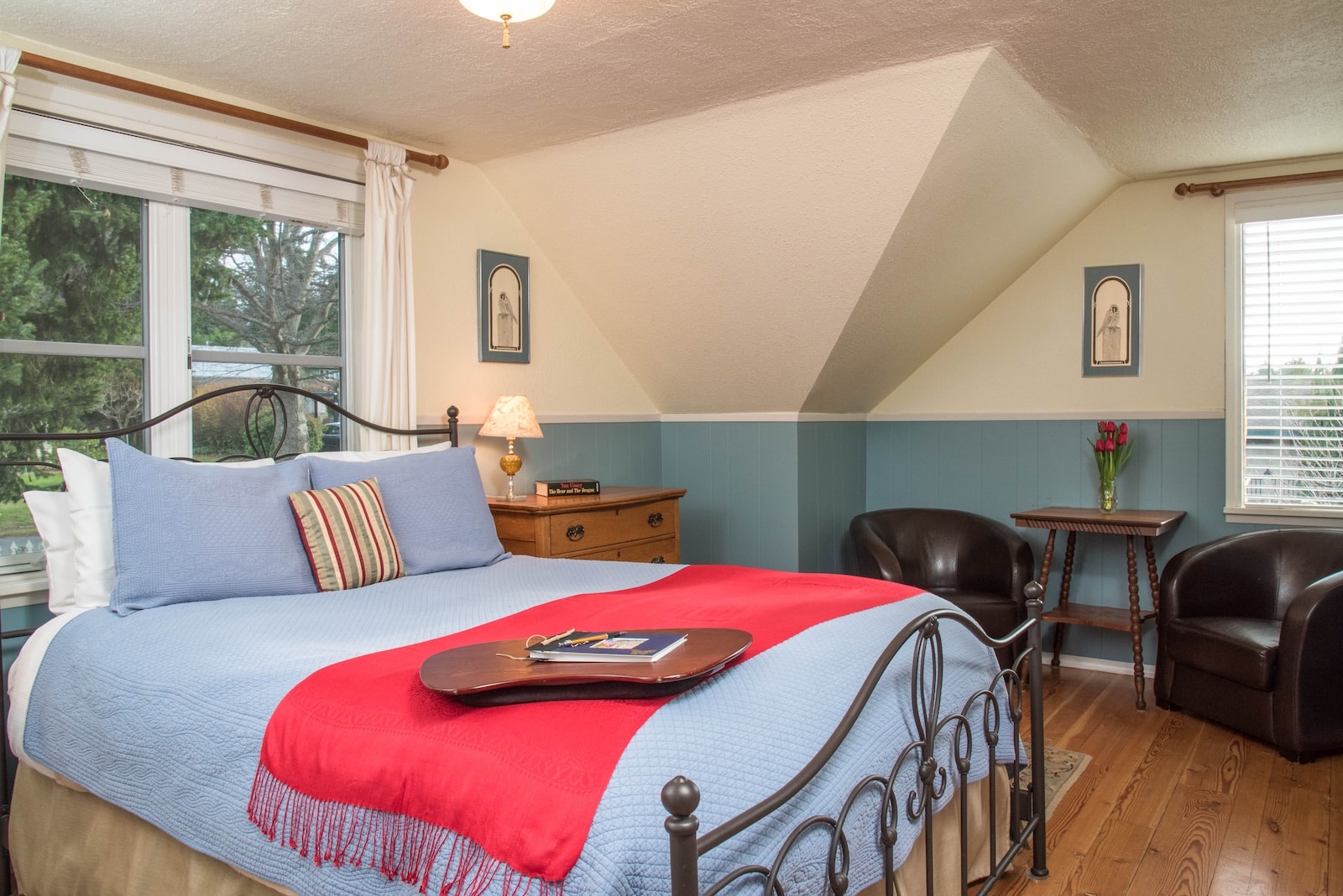 Our San Juan Island Lodging is top rated. Enjoy this room with a king sized bed, big window, and seating area.